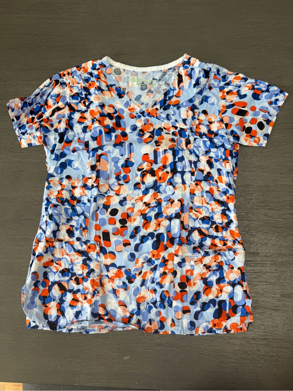 Women’s V-Neck Short Sleeve Top in Blue and Orange Abstract Print